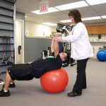 Physical Therapist with patient